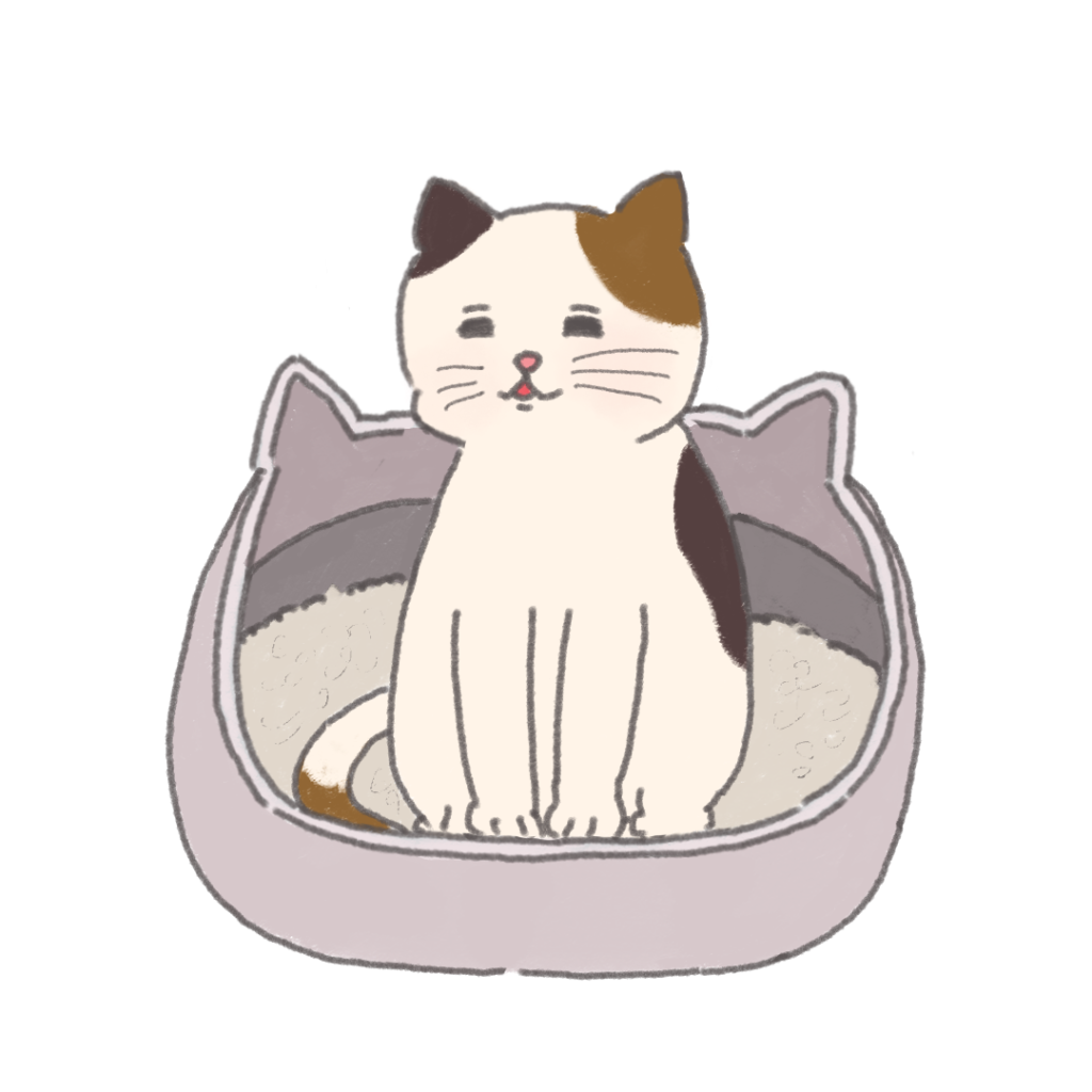 ねこ型の猫用トイレに座っているまだらのぶちねこ