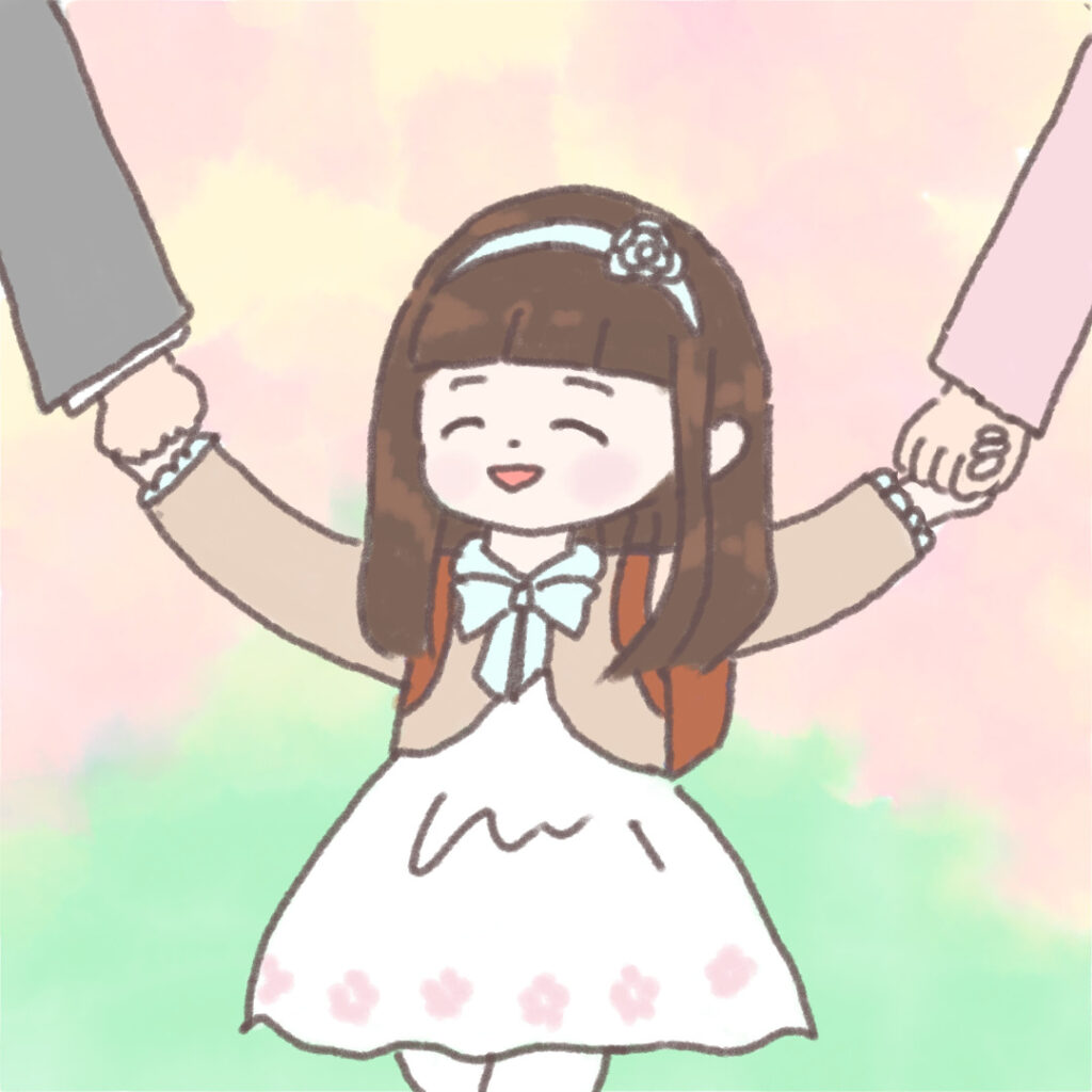 入学式に両親と手を繋ぎ嬉しそうにしている花柄ワンピースの女の子