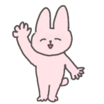 右手を上げるピンクのウサギ