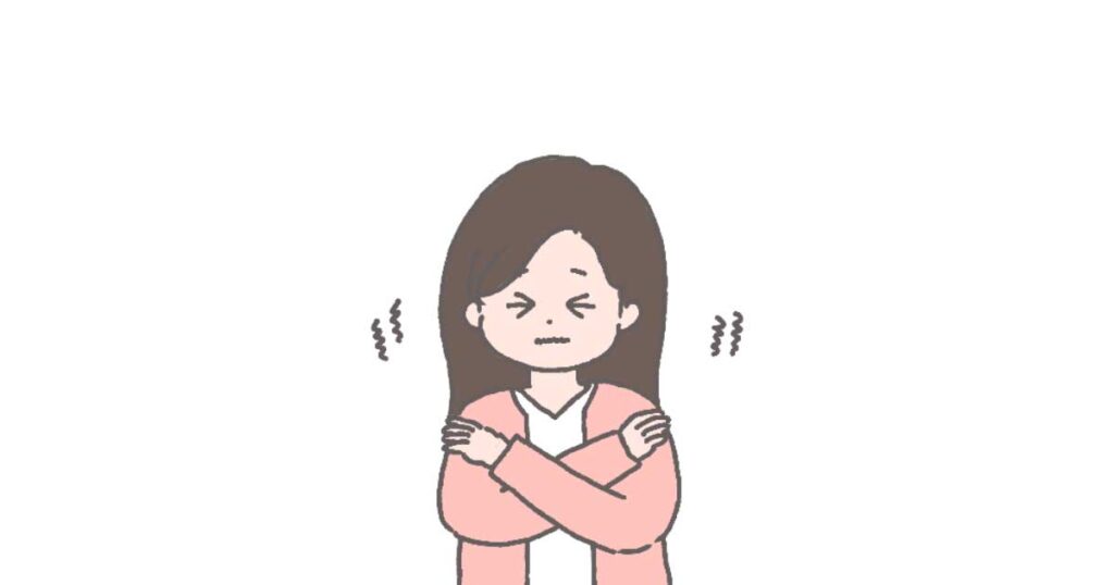 寒がっている女性のイラスト